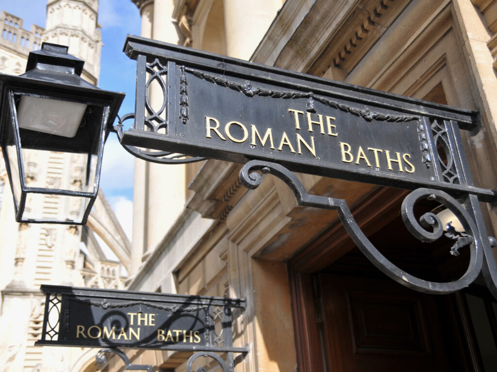 Sign saying "The Roman Baths"