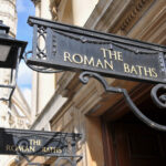 Sign saying "The Roman Baths"