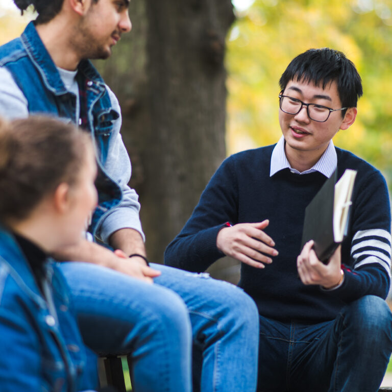 students talking outside